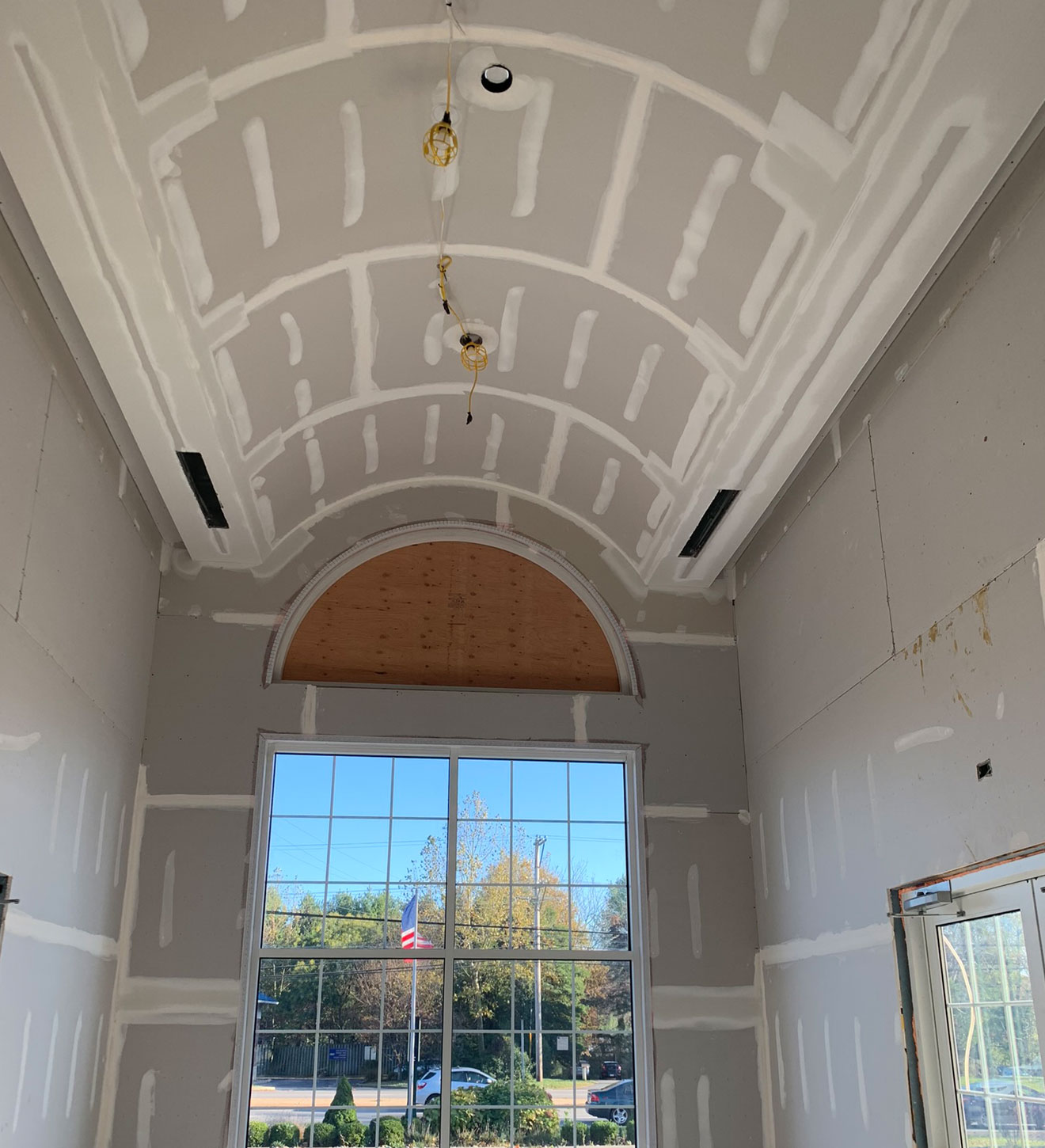 fixed drywall ceiling for a funeral home that is now ready to paint